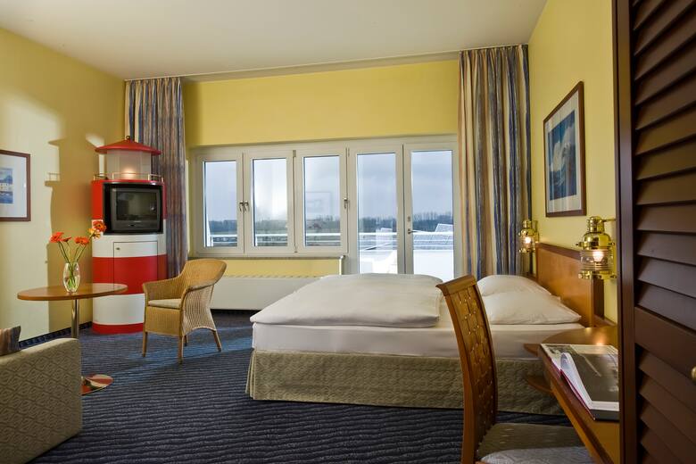 Guest room at the Wyndham Stralsund HanseDom in Stralsund, Other than US/Canada